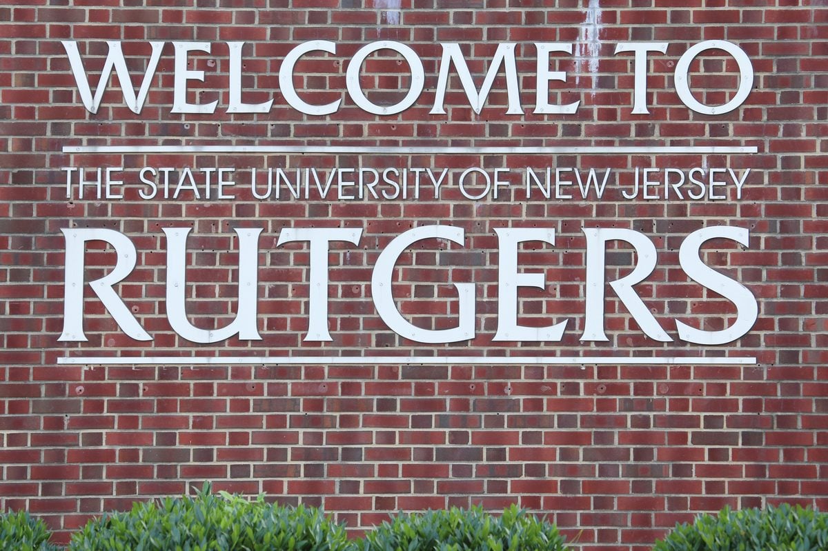 A sign at an entrance to rutgers university. Rutgers, the state university of new jersey, is an american public research university.