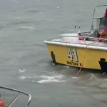 Sailboat moored in seaside heights washes ashore in waretown as sea tow continues operations through nor'easter