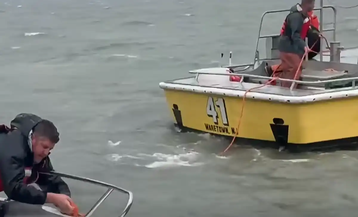 A sea tow crew recovers a boat that broke free during the nor’easter along the ocean county coast.