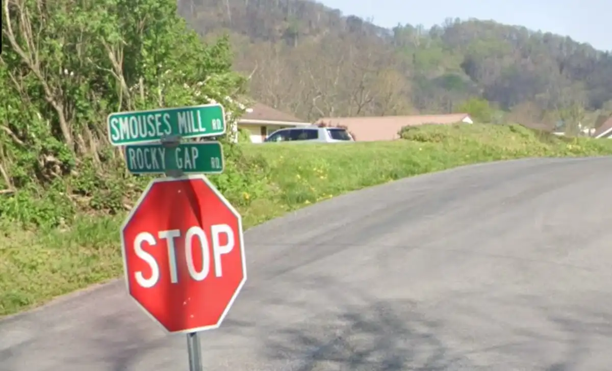 Emergency crews respond to Smouses Mill Road in Allegany County after a crash brought down a utility pole and power lines.