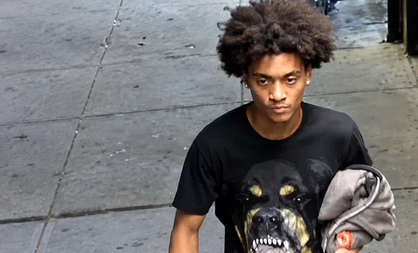 The nypd is searching for this suspect after investigators say a gunman opened fire at a group of people on east burnside avenue in the bronx.