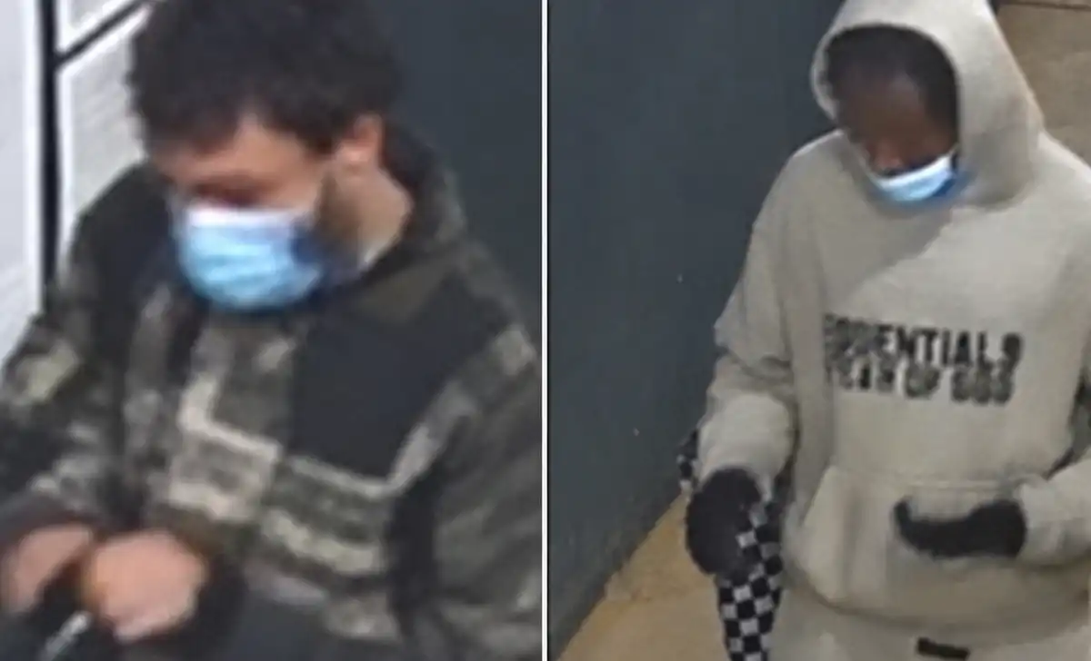 Nypd is searching for two suspects accused of displaying a firearm and stealing a man's wallet, cellphone and backpack during a queens robbery