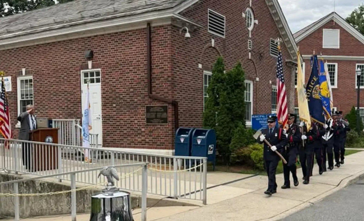 Teaneck police, firefighters, EMS volunteers and public works employees joined residents to commemorate the 25th anniversary of the Sept. 11 attacks.