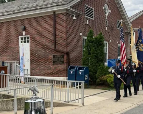 Teaneck police, firefighters, EMS volunteers and public works employees joined residents to commemorate the 25th anniversary of the Sept. 11 attacks.