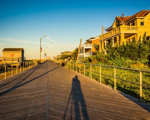 The boardwalk at sunrise in Ventnor City, New Jersey. Photo by Jon Bilous