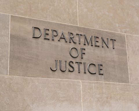 A new Justice Department legal opinion could create a conflict between federal immigration reporting requirements and New Jersey's restrictions on state and local cooperation with civil immigration enforcement.