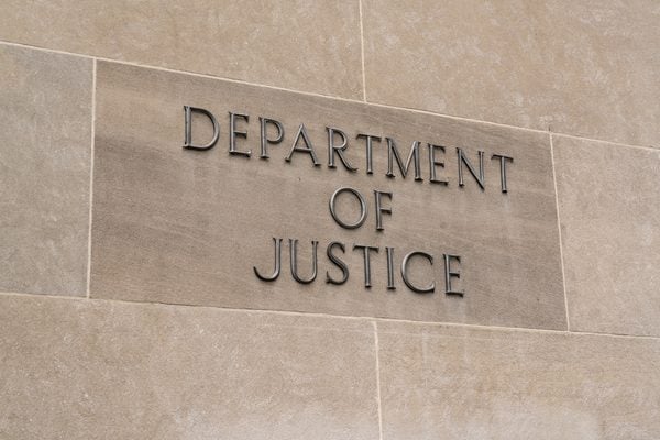 A new Justice Department legal opinion could create a conflict between federal immigration reporting requirements and New Jersey's restrictions on state and local cooperation with civil immigration enforcement.