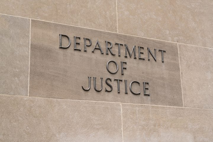 A new Justice Department legal opinion could create a conflict between federal immigration reporting requirements and New Jersey's restrictions on state and local cooperation with civil immigration enforcement.