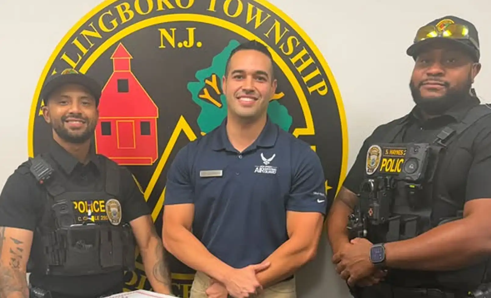 Staff Sergeant Cartwright donated pizzas to township officers in a show of support from the Joint Base community.