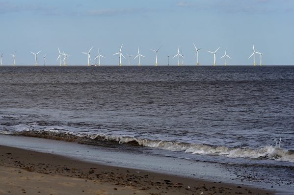 Wind farm off coast. Wind turbines off Norfolk coast