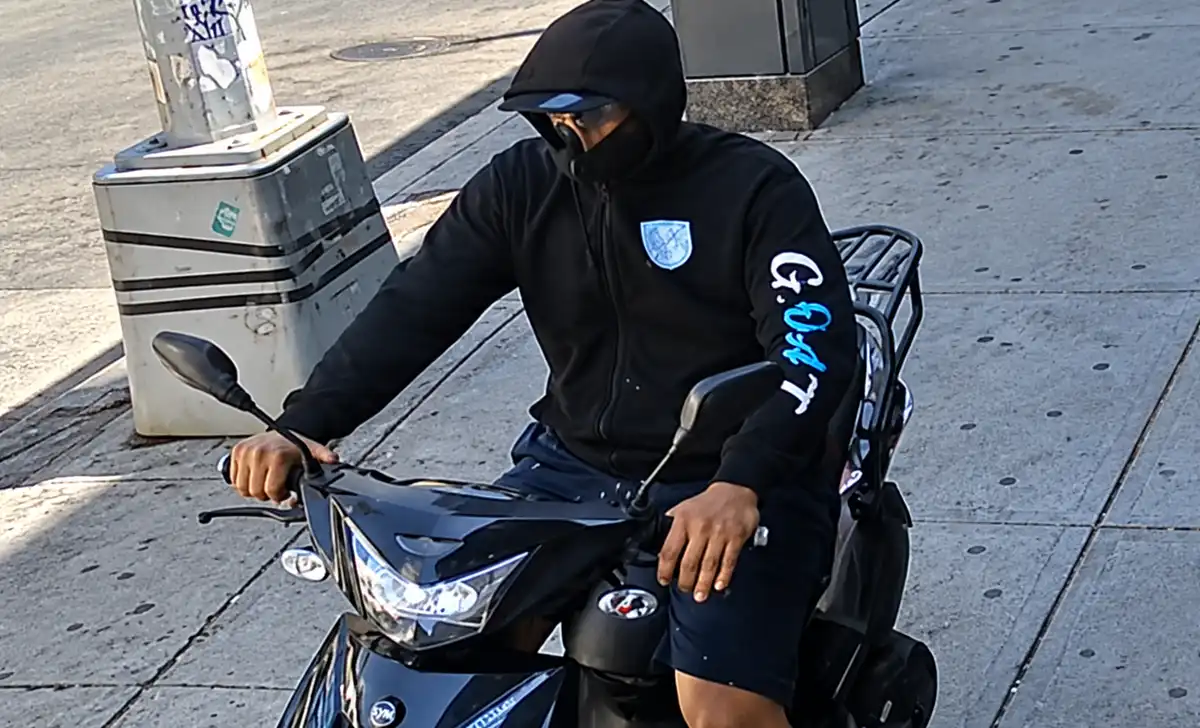 The NYPD is searching for a moped rider accused of stealing a bag containing passports and other documents from a 77-year-old man in the Bronx.