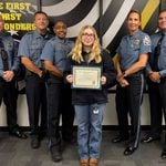 Anne arundel county dispatcher honored for handling armed domestic barricade call