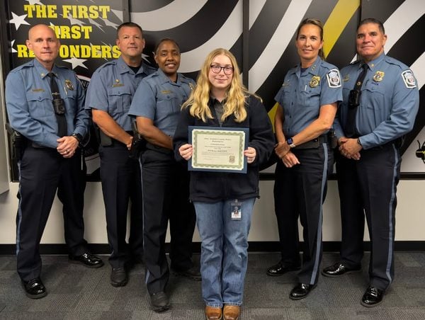 Police communications officer beall was recognized by anne arundel county police for coordinating the response to an armed domestic violence call that developed into a potential barricade.