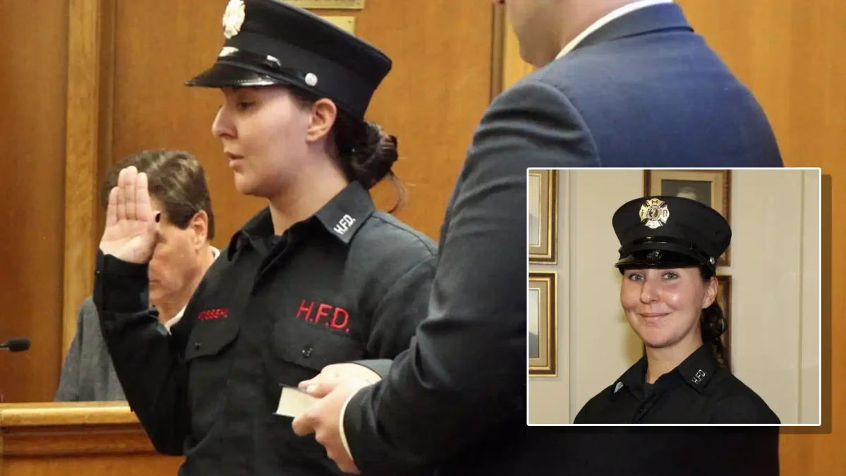 Kelly possehl takes the oath as a hackensack firefighter during a city council meeting. Photo courtesy of paramus fire co. 3.