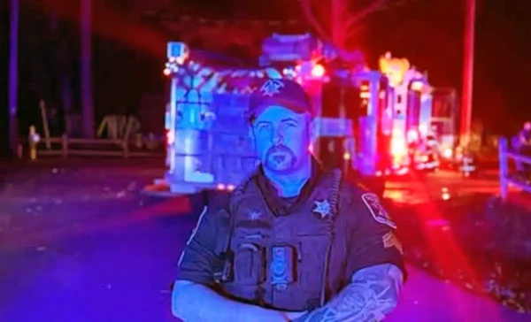 Halifax county sheriff's sergeant alex wood rescued an elderly man from a burning home in roanoke rapids, north carolina, on october 8, 2026, with assistance from lieutenant e. Richardson.