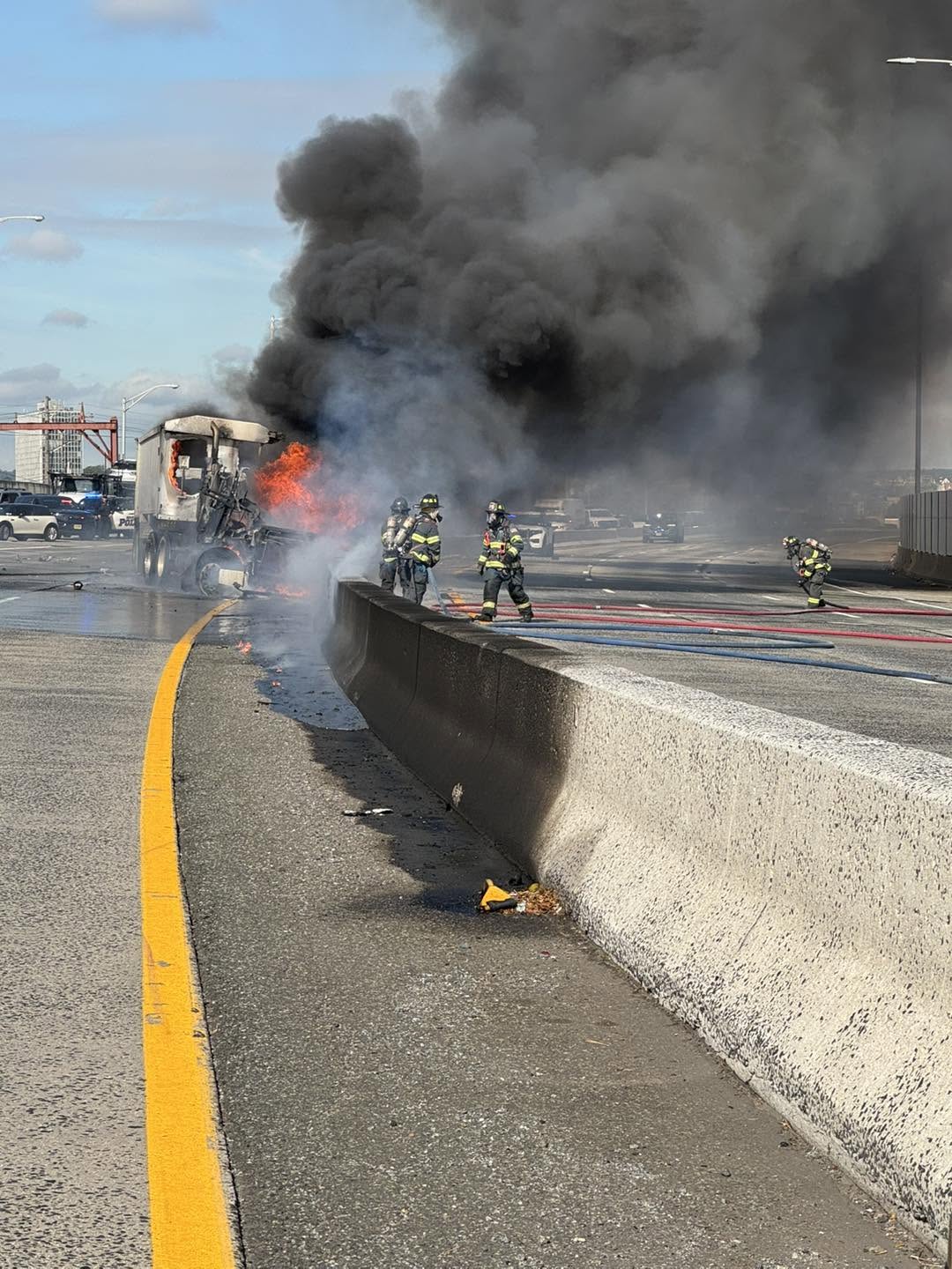 Tractor-trailer erupts in flames on route 280 in harrison, burning fuel spreads along highway median
