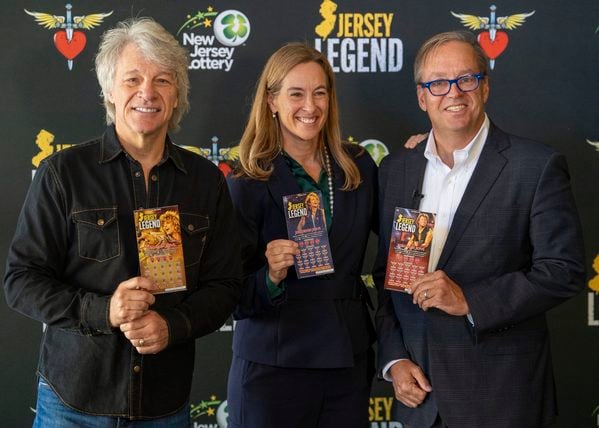 Gov. Mikie sherrill and jon bon jovi launch the new jersey legend scratch-off at jbj soul kitchen in red bank.