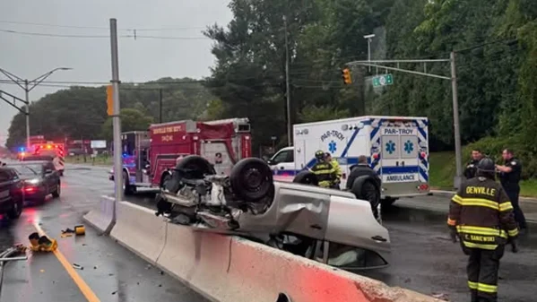 A driver was trapped in an overturned vehicle on route 10 during a september 27 nor’easter, prompting a joint response from mount tabor and denville crews. Photo by mount tabor volunteer fire department.
