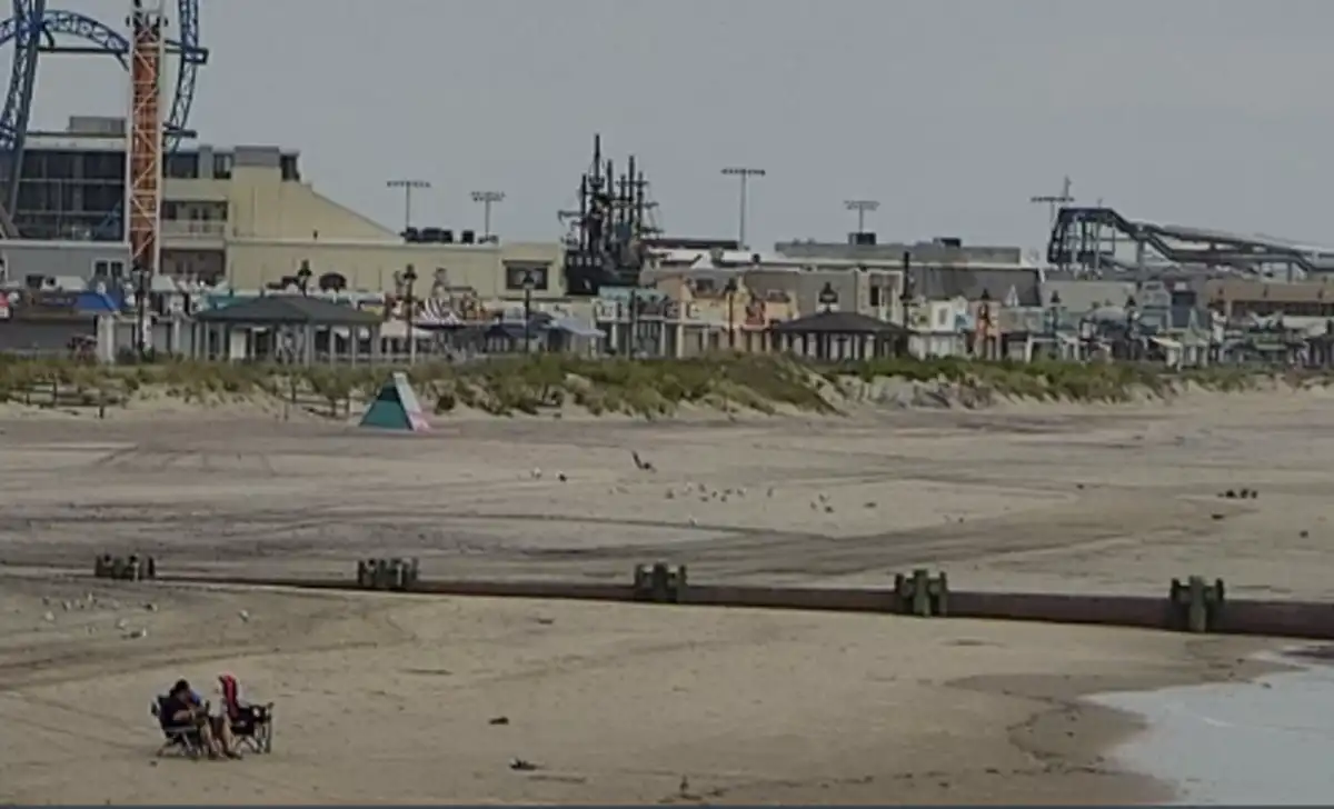 Ocean city mayor warns exposed ev batteries at risk of fire after ocean flooding Ocean city beach cam - berger realty