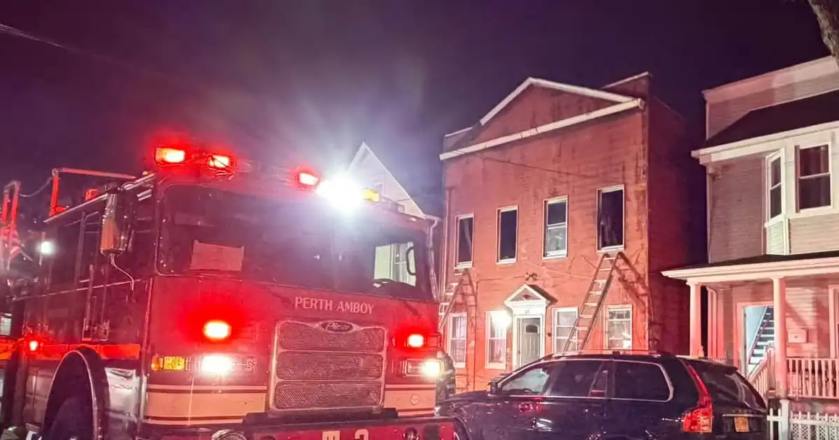 An overnight fire at 671 catherine street in perth amboy spread to a neighboring building and left seven people injured.