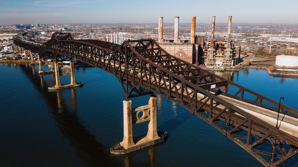 Vehicles sit backed up near the pulaski skyway after a crash shut the roadway in both directions tuesday afternoon near raymond boulevard and the u. S. 1&9 truck route.