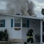 Firefighters rescue family pet from burning home in martin county, florida