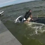 New york state trooper smashes sunroof to rescue man trapped in sinking vehicle at boat launch