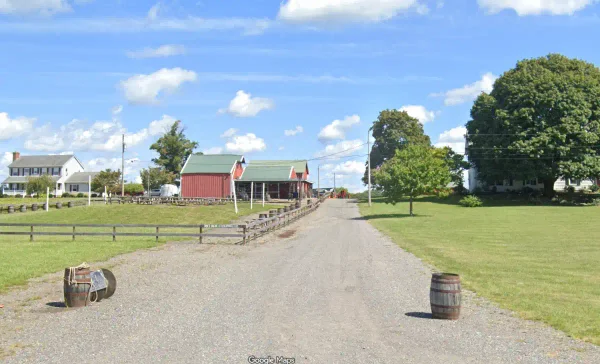 Emergency crews respond after a child was killed and a 66-year-old woman seriously injured when an suv backed into them at screamin’ hill brewery in upper freehold.