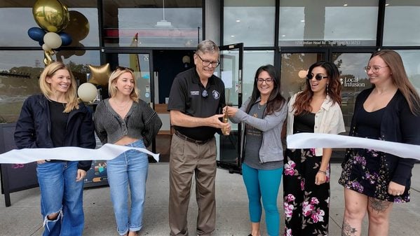 Toms river councilman craig coleman joins the ribbon-cutting celebration for shine studios, a new yoga, barre, pilates and strength training business at 1256 indian head road.