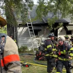 Firefighters respond to working house fire with person trapped in swedesboro