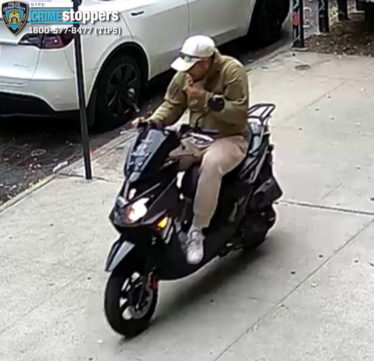 Moped bandit rips gold chain off woman's neck on manhattan street