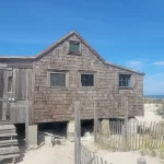 Historic shack on island beach survived noreaster, but beach buggy access comes with high tide warning