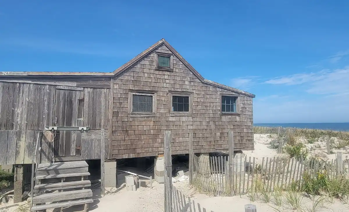Historic shack on island beach survived noreaster, but beach buggy access comes with high tide warning The judge's shack at island beach state park - photo by njdep
