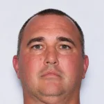 Virginia high school football coach still missing nearly 11 months after vanishing into woods, wanted on child exploitation charges