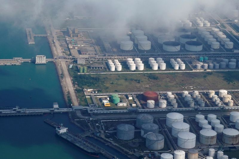 Oil slides on Friday, but climbs for 5th week on supply concerns