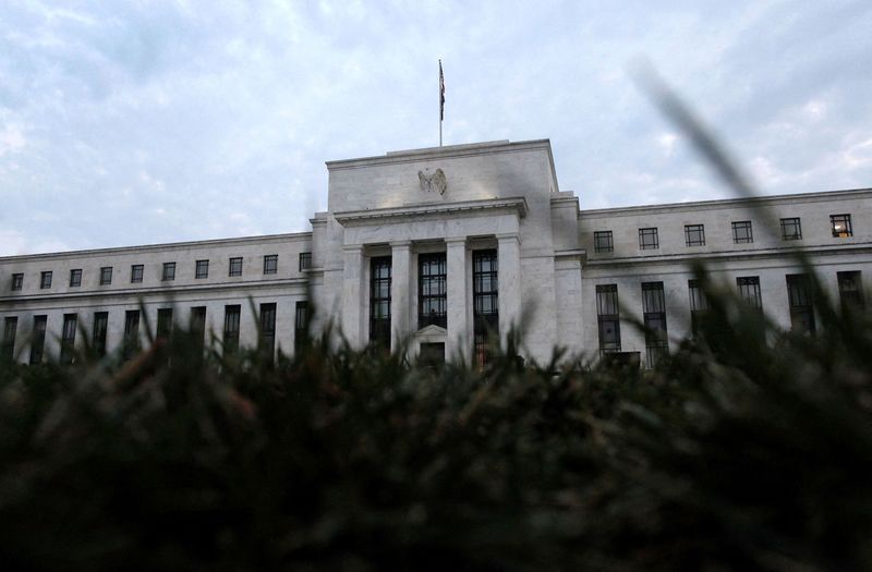 Wall Street shakes off Fed, Ukraine anxiety as oil dips