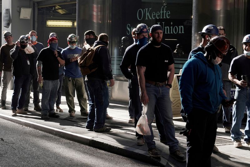 U.S. worker productivity rebounds in fourth quarter; labor costs tepid
