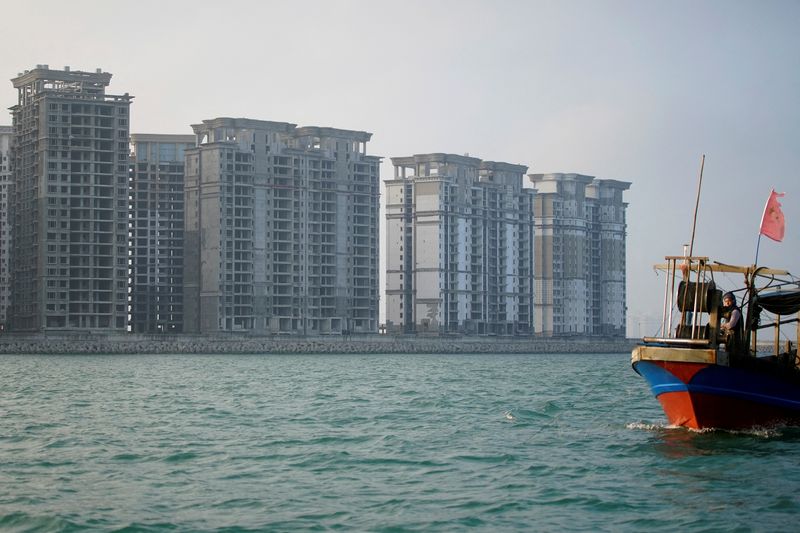 China courts freeze $157 million of Evergrande assets over missed construction payments