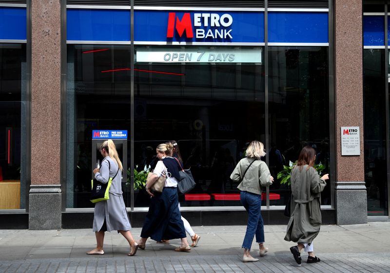 Metro Bank's annual loss narrows, cautious on outlook
