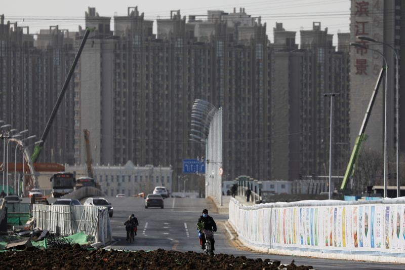 China vows to keep property market stable, meet demand this year