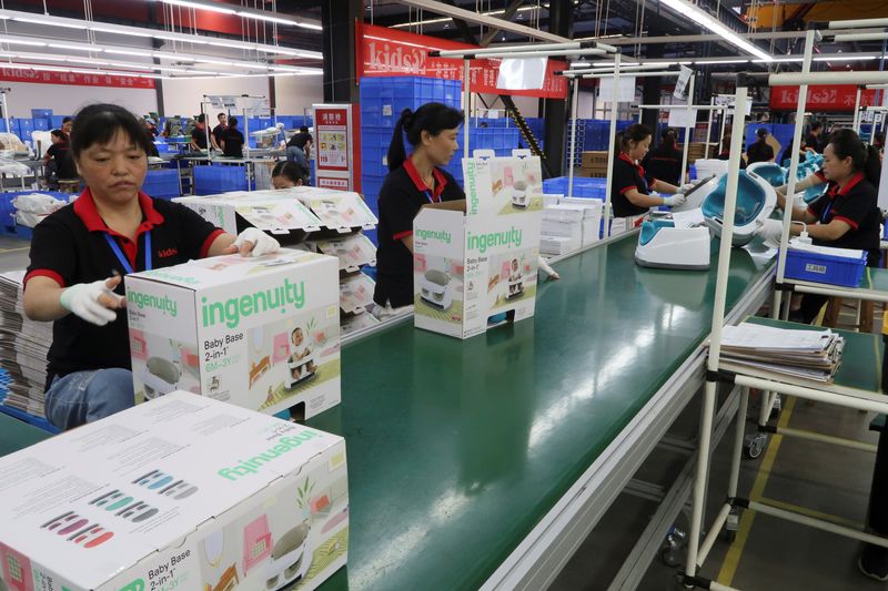 China's factory growth picks up as demand improves, Ukraine crisis raises risks