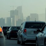 FILE PHOTO: Commuters navigate early morning traffic as they drive