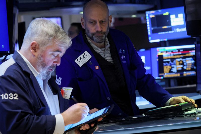 Wall St ends down in rocky session as U.S. bans Russian oil imports