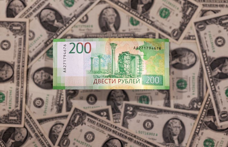 Rouble off 2-week highs as Putin signs capital control decree