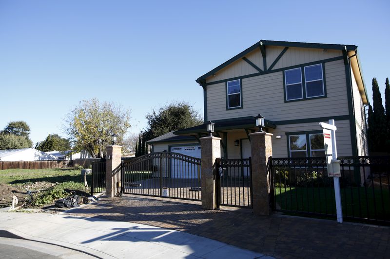 U.S. home sales slide as prices break above $400,000 for first time