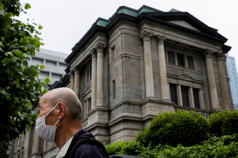 BOJ may need to adjust yield cap if inflation overshoots - ex central bank official