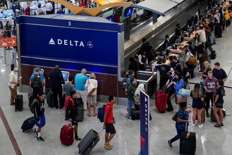 Analysis-Flight delays, cancellations mar U.S. summer travel