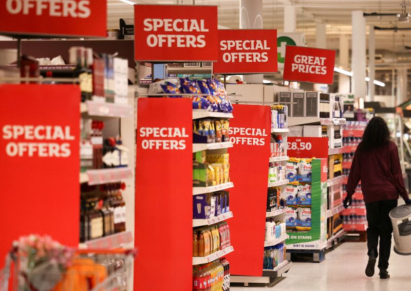 Savings and algorithms: UK supermarkets battle cost of living crisis