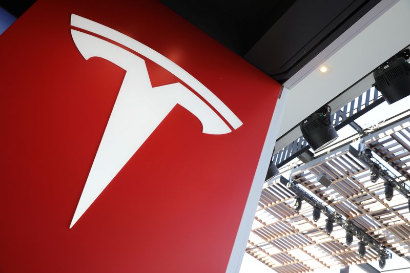 Tesla profit tops target; Musk says high prices could hurt demand