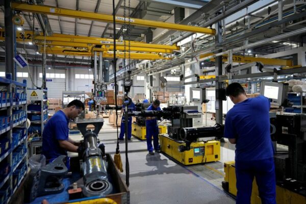 China steps up easing, cuts lending benchmarks to revive faltering economy